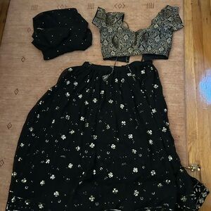 Black and gold lehenga choli